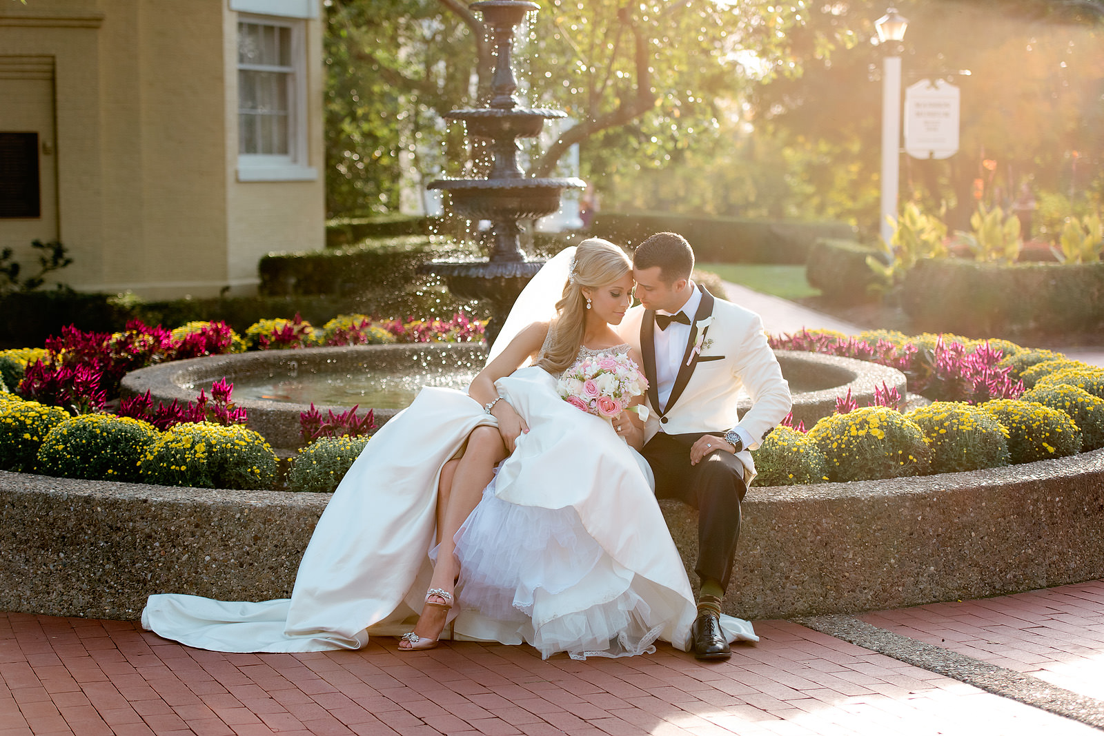 Bride and groom beside the fountain at Oglebay Resort